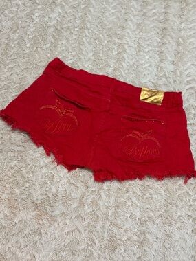 Vintage GRAIL Red Apple Bottom Jean shorts with gold accents